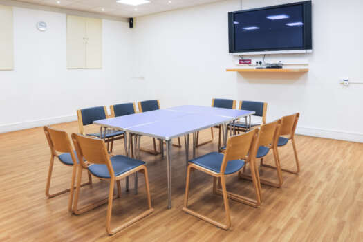 The Forum at All Souls Langham Place, set up with tables and chairs.