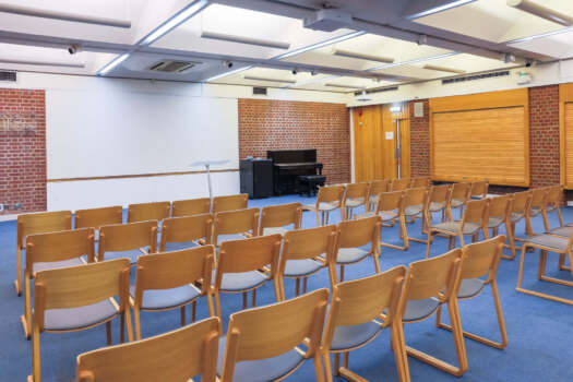 The Waldegrave Hall at All Souls Langham Place, set up with chairs in rows.