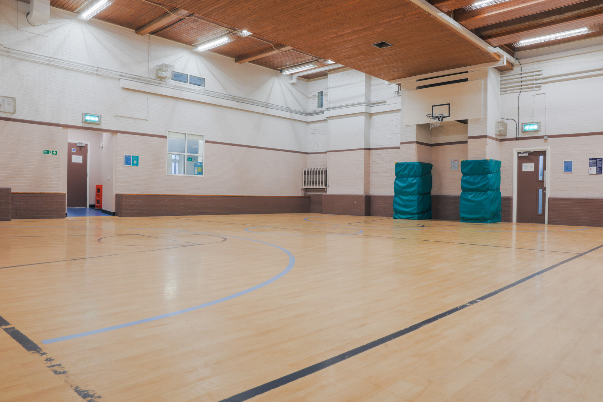The gym at All Souls Clubhouse, set up as an empty room.