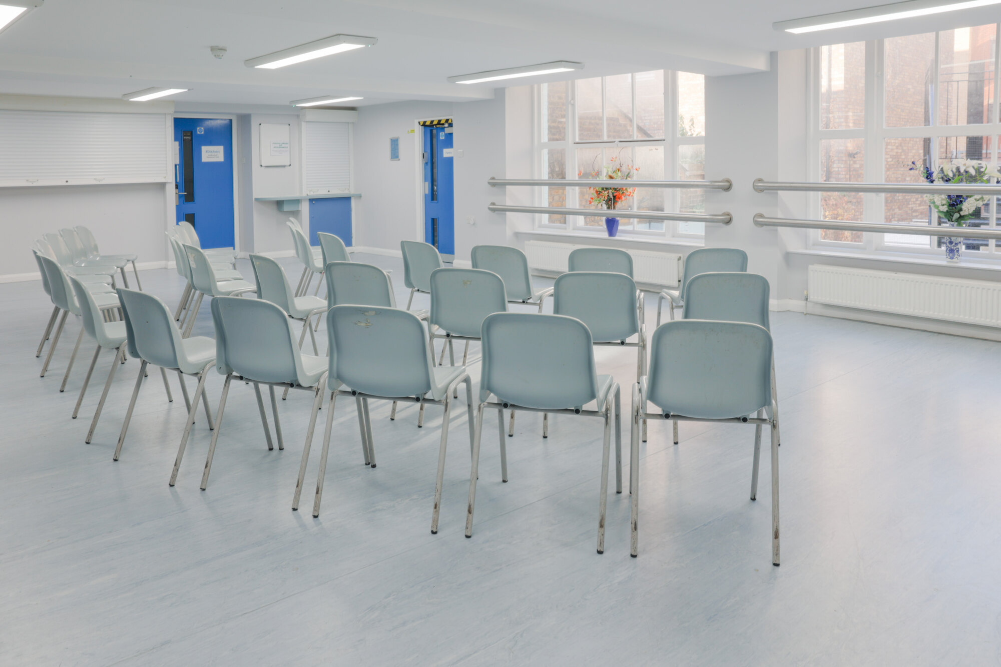 The Dining Room at All Souls Clubhouse, set up with chairs in rows.